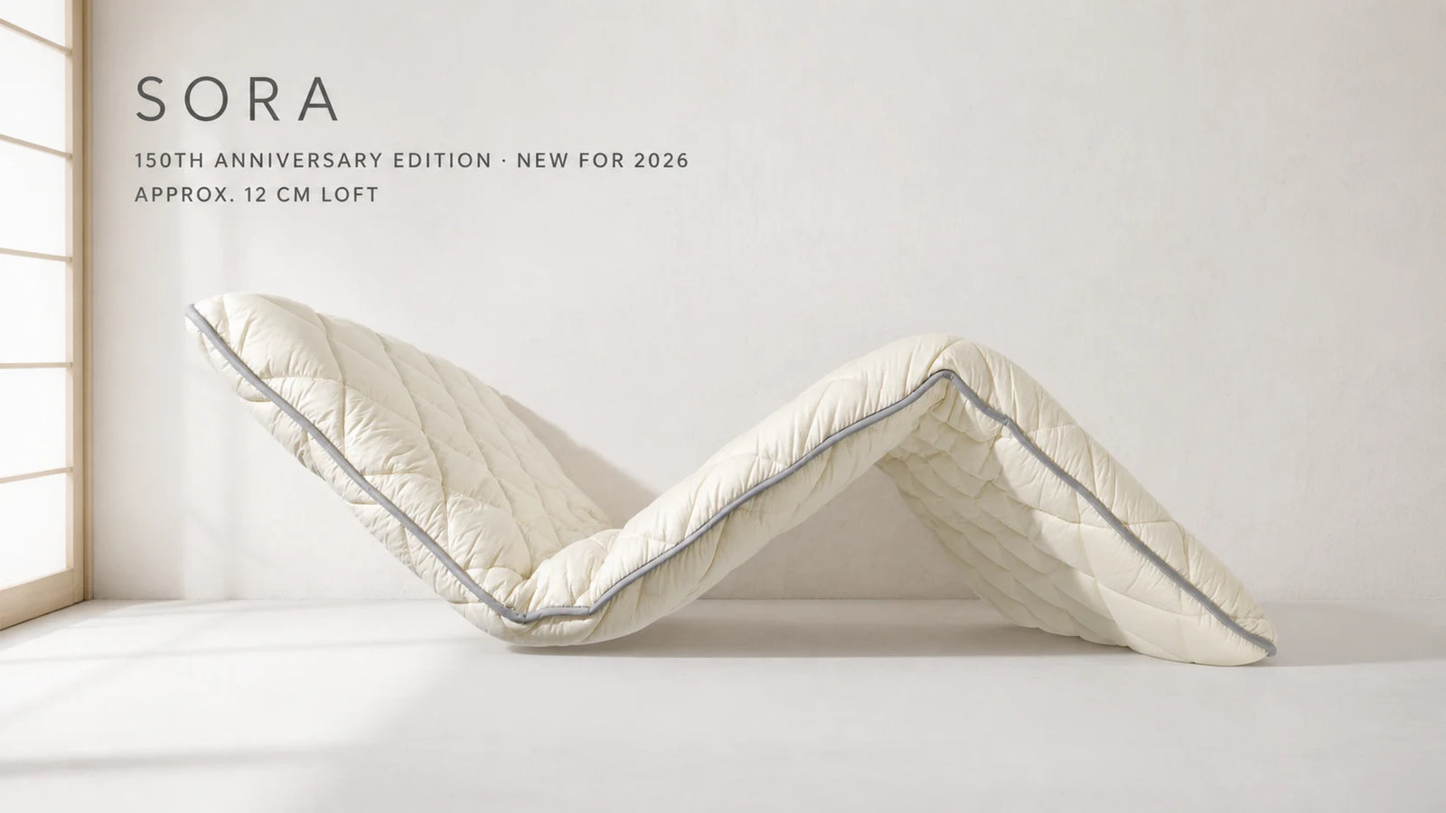 SORA 150th Anniversary Limited Edition flexed into a wave, showing approx. 12 cm loft and foldable construction