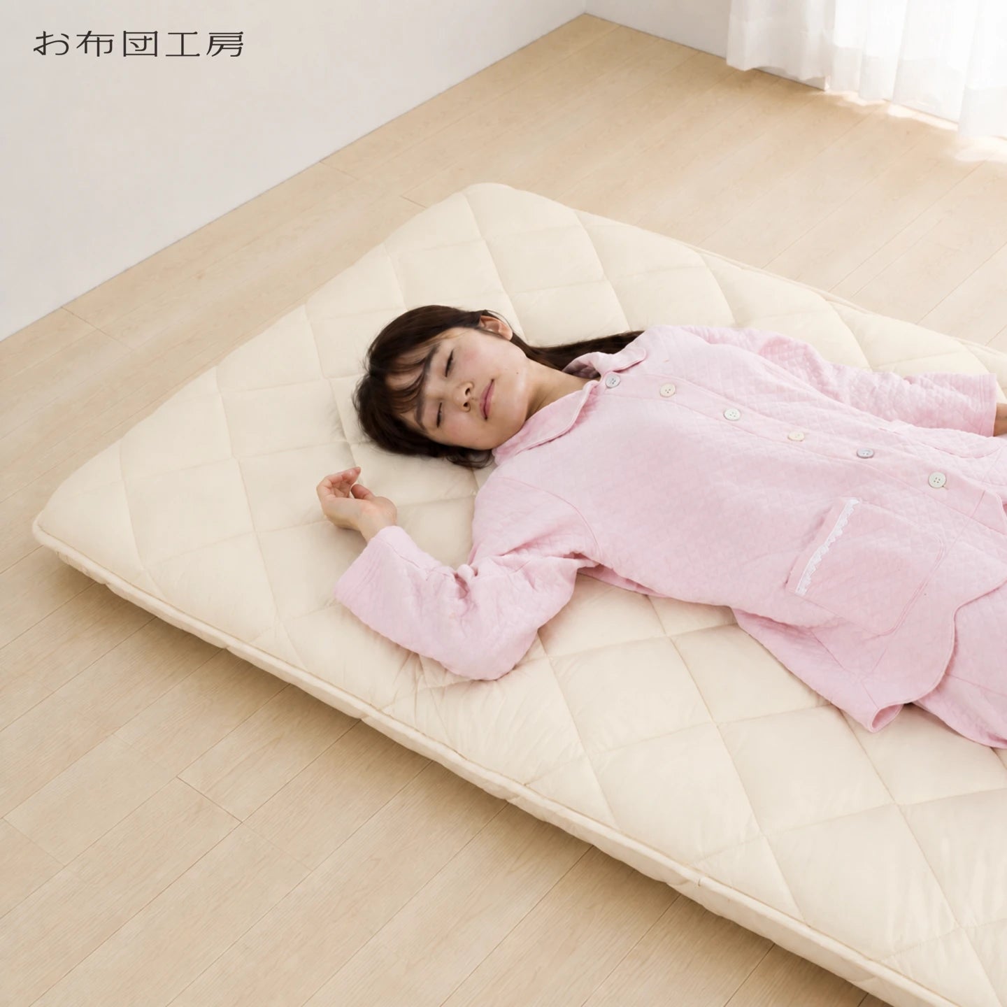 Sleeper resting on SORA, showing the fuller quilted surface and balanced medium feel