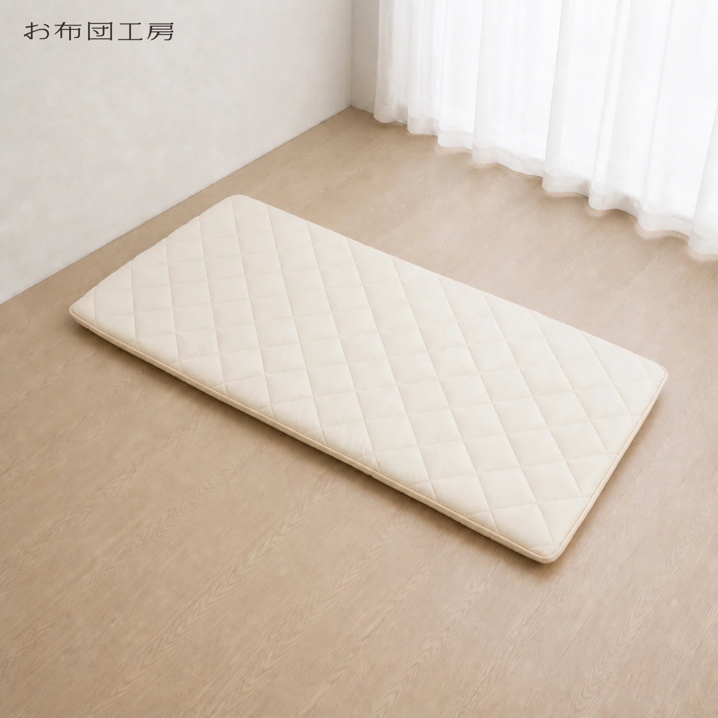 SORA Japanese shikibuton in warm ivory, made with a 50 percent premium wool blend