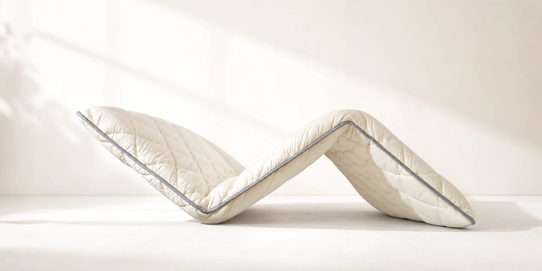 SORA shikibuton showing generous loft and foldable structure